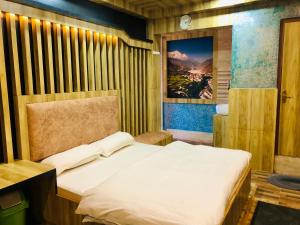 Voodi või voodid majutusasutuse Sara's Backpackers Hotel toas