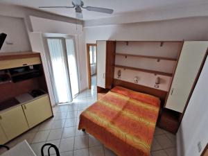 Postel nebo postele na pokoji v ubytování B&B Residence Sorriso