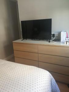 Een TV en/of entertainmentcenter bij Piso entre la playa y Bilbao
