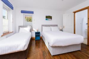 Voodi või voodid majutusasutuse An Capall Dubh B&B Dingle toas