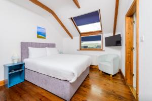 Voodi või voodid majutusasutuse An Capall Dubh B&B Dingle toas