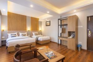 Postel nebo postele na pokoji v ubytování Aawas Boutique Hotel