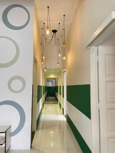 Gallery image of Muslim Homestay Teluk Intan ( Hotel Style Room ) by Mr Homestay in Teluk Intan +24 photos