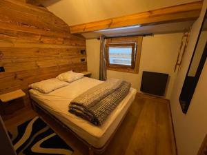 Ένα ή περισσότερα κρεβάτια σε δωμάτιο στο Appartement La Plagne 1800