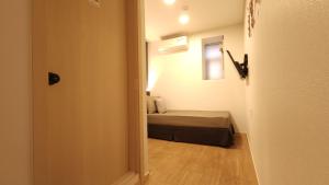 Ліжко або ліжка в номері OYO Hostel Myeongdong 1