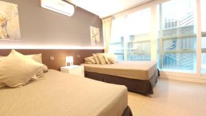 Ліжко або ліжка в номері OYO Hostel Myeongdong 1