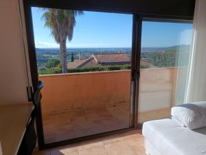 A bed or beds in a room at Villa El Mirador