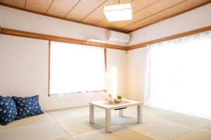 Posezení v ubytování Nagashima Riverside House 4