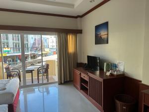 TV a/nebo společenská místnost v ubytování Sabai Sabai hotel + 19 fotografií