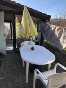 Patio nebo venkovní prostory v ubytování Logement entier