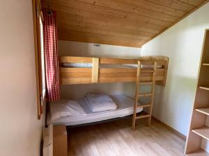 Postel nebo postele na pokoji v ubytování Camping Les Etoiles