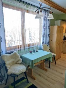 Posedenie v ubytovaní Apartamenty u drwala