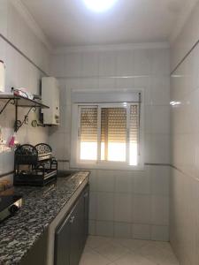 Kuchyň nebo kuchyňský kout v ubytování Maison de plage