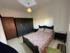 Postel nebo postele na pokoji v ubytování Maison de plage