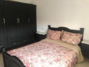 Postel nebo postele na pokoji v ubytování Maison de plage