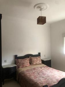 Postel nebo postele na pokoji v ubytování Maison de plage