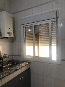 Kuchyň nebo kuchyňský kout v ubytování Maison de plage
