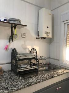 Kuchyň nebo kuchyňský kout v ubytování Maison de plage