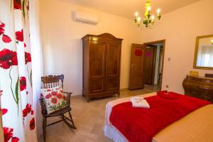 Postel nebo postele na pokoji v ubytování LA CASA DELLA MAMMINA