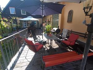 Ein Balkon oder eine Terrasse in der Unterkunft Gästehaus HarzGlück