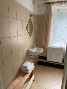 Kylpyhuone majoituspaikassa Apartamenty AGAT