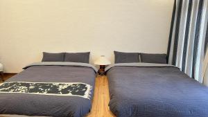 Letto o letti in una camera di 三米-鶴舞琵琶湖-biwako