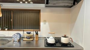 Cucina o angolo cottura di 三米-鶴舞琵琶湖-biwako