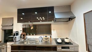 Cucina o angolo cottura di 三米-鶴舞琵琶湖-biwako