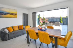 Et opholdsområde på Dexters Den - Sea views, yards from Beach