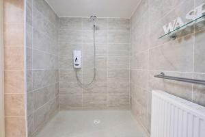 Ένα μπάνιο στο Bespoke Bungalow Salford Quays - Garden, WiFi and Parking +49 φωτογραφίες