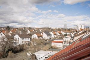 a view of a town with houses and buildings at Stilvolles Apartment in Schweinfurt