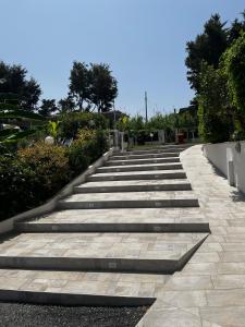 a set of steps leading up to a park at Hotel Ristorante Santa Maria in Amantea