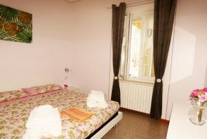 Кровать или кровати в номере Casa Vacanze Sabrina