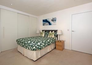 Postel nebo postele na pokoji v ubytování Cosy Apartment in Central London