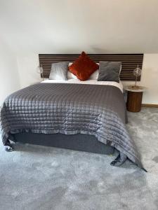 Postel nebo postele na pokoji v ubytování Druid House B&B