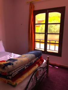 Postel nebo postele na pokoji v ubytování SEVEN DAYS HOTEL
