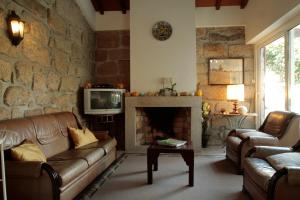 A seating area at Hotel Rural Villa do Banho