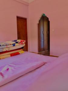 Postel nebo postele na pokoji v ubytování SEVEN DAYS HOTEL