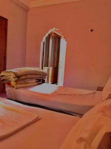 Postel nebo postele na pokoji v ubytování SEVEN DAYS HOTEL
