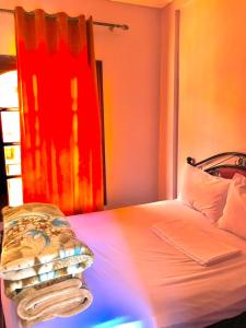 Postel nebo postele na pokoji v ubytování SEVEN DAYS HOTEL