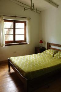 Säng eller sängar i ett rum på Casa del Río, privacidad, monte y paz