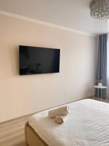 Een TV en/of entertainmentcenter bij Семейная отличный вариант с детьми /Smart TV
