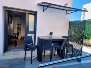 Un balcon sau o terasă la Alojamiento Playa de Covachos 2