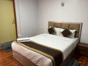 Postel nebo postele na pokoji v ubytování Royal Vista - Guest House