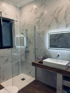 Salle de bains dans l'établissement Diamonds Luxury Apartments