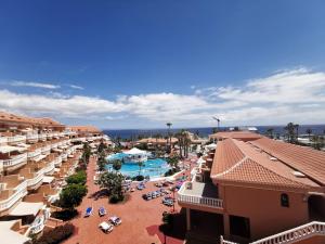 an aerial view of a resort with a swimming pool at Tenerife Royal Gardens - Las Vistas TRG - Viviendas Vacacionales in Playa de las Americas