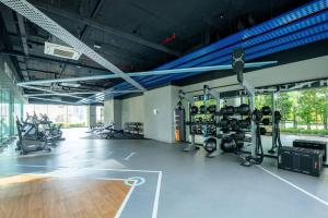 a gym with cardio equipment in a building at Cityscape KL Sentral@Sentral Suite-MRTLRTMonorail in Kuala Lumpur