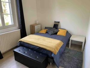 Кровать или кровати в номере Rugles Cocooning