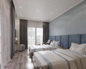 Un pat sau paturi într-o cameră la Wonderland Villa Hồ Tràm Beach