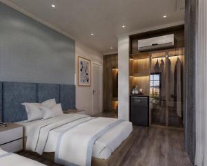 Un pat sau paturi într-o cameră la Wonderland Villa Hồ Tràm Beach